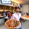 Michael Vakneen is one of the co-partners in Pop Up Pizza, which has been an immense success since opening a few months ago Downtown.