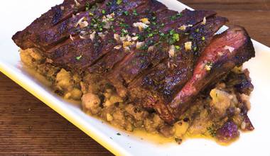 The food is just more interesting at this neighborhood bar. Try making the skirt steak and crushed potatoes in your kitchen.