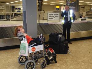 Davis at Heathrow airport. Her Elite Traveller motor scooter took an hour and a half to materialize.