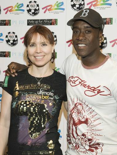 Annie Duke and Don Cheadle teamed to raise awareness and money for Darfur at Cheadle’s WSOP charity tournament.