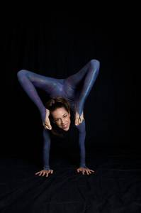 This multi-talented contortionist uses some interesting parts of her body to play a mean game of billiards.