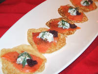 Savory mini-crepes with smoked salmon and dill sour cream by Firefly.