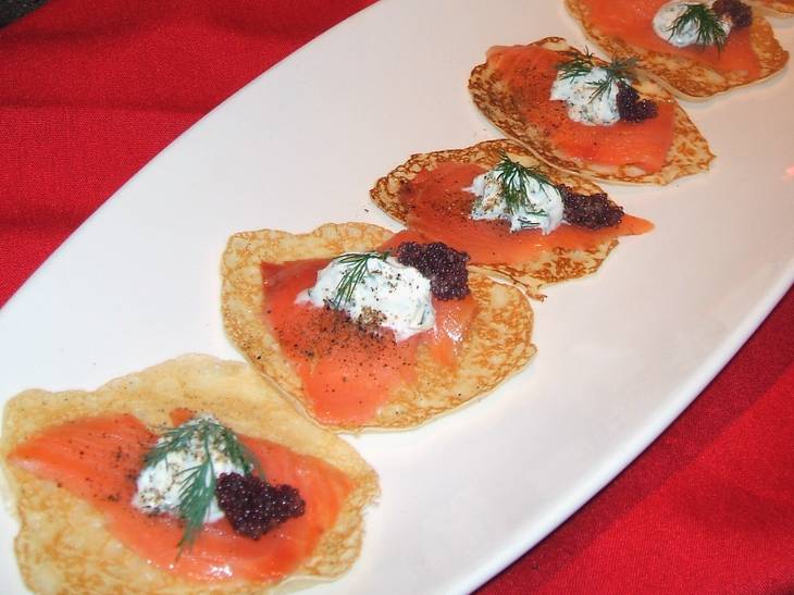 Savory mini-crepes with smoked salmon and dill sour cream by Firefly.