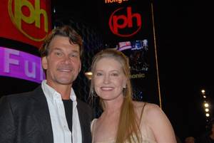 Patrick Swayze and wife Lisa Niemi outside Planet Hollywood.