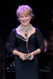 Struggling financially, Nevada Ballet Theatre tabbed Bette Midler as its silver anniversary Woman of the Year, even if Divine Miss M could not make it to last night's Black & White Ball until the very end.