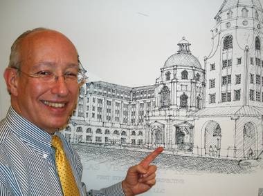 Nir Buras stands next to a proposal for a new city hall in Las Vegas.
