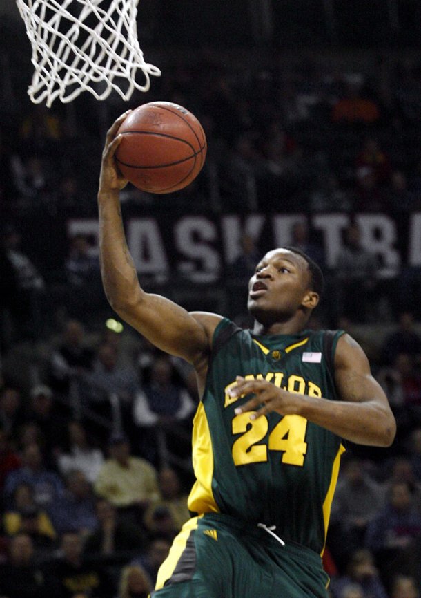 Baylor's LaceDarius Dunn (24) goes for the basket against Kansas in the second half during an NCAA college basketball game at the Big 12 Conference men's tournament in Oklahoma City, Thursday, March 12, 2009.