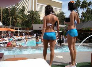Waitresses watch the pool action at Bare in The Mirage.