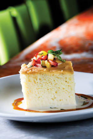 Tres leches cake, a sweet and moist dessert made with three kinds of milk.