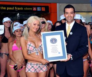 Holly Madison, Guinness Book of World Records executive Danny Girton and the world record proclamation.