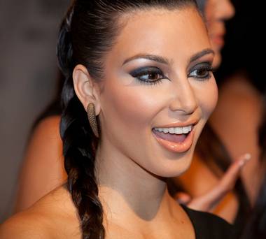 Kim Kardashian joined her sisters and boyfriend Reggie Bush at Caesars Palace Friday, June 26. 