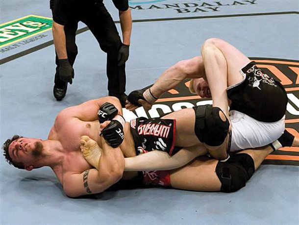 Mir submits Lesnar at UFC 81 in February 2008.