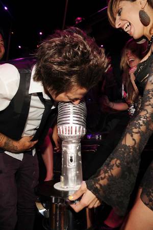 Ryan Cabrera gets a mouthful of microphone during his 27th birthday celebration at Prive.