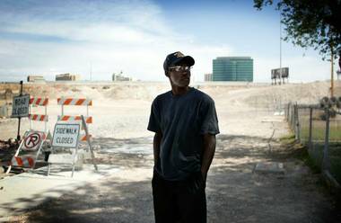 Saul Willis stands on the portion of F Street near his home at McWilliams Avenue that was closed in September to make way for the Interstate 15 widening project.