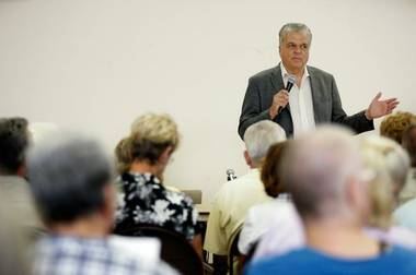 County Commissioner Steve Sisolak moderates during a Searchlight Town Hall Meeting about a proposed wind energy project at the Searchlight Community Center Thursday, June 25, 2009.