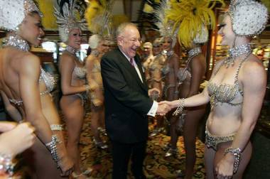 Las Vegas Mayor Oscar Goodman (that’s him in the center) greets Jubilee! showgirls in the Golden Nugget before making his grand entrance to a party celebrating his 70th birthday at Fremont Street Experience.