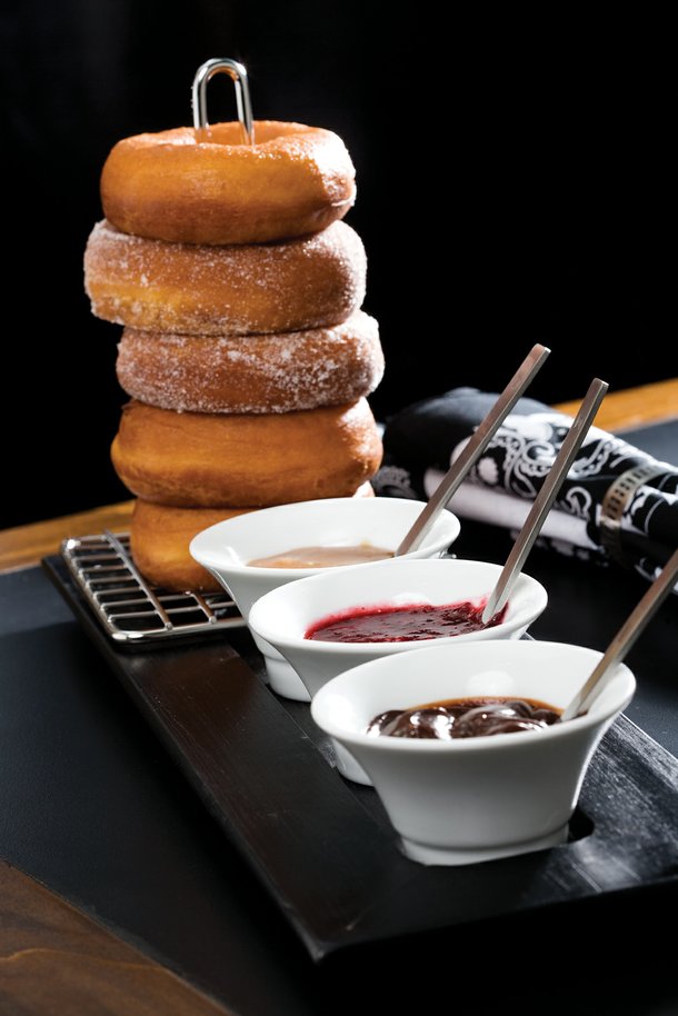 Don't you want a doughnut? At First Food & Bar they come with multiple dipping sauces; they're actually dunking doughnuts. 