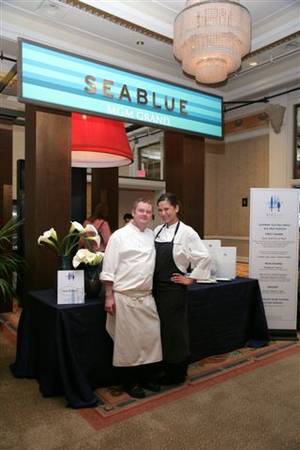 Stephen Hopcraft and Santanna Salas pause outside Seablue at the MGM Grand during shooting for Food Network show <em>Chefs vs. City</em>.