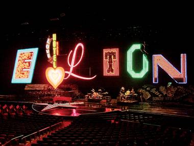 John’s neon signs in their old Caesars Palace home.