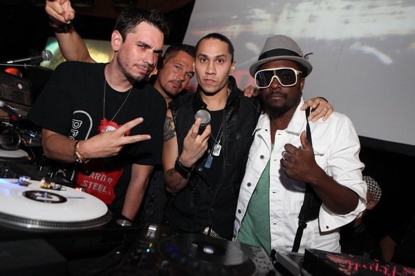 DJ AM, left, poses with, from left, DJ R.O.B and Black Eyed Peas' Taboo and Will.i.am early Saturday morning, Aug. 22, 2009, at Rain in the Palms in Las Vegas.
