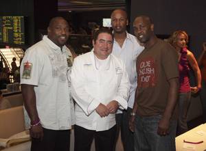 Retired NFL star Warren Sapp joined Emeril Lagasse, Lakers Coach Brian Shaw and retired basketball star Gary Payton for the opening of Lagasse's Stadium at the Palazzo.