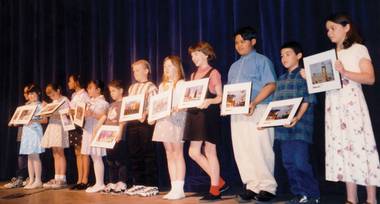 Fourth-graders from across the Valley are honored during a 1997 ceremony. The art they created was selected to become part of a mural at McCarran International Airport’s D Gate.