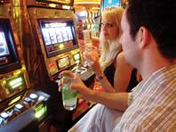 Sit at a slot machine, and the drinks will flow... so will the irritated looks from the ladies.