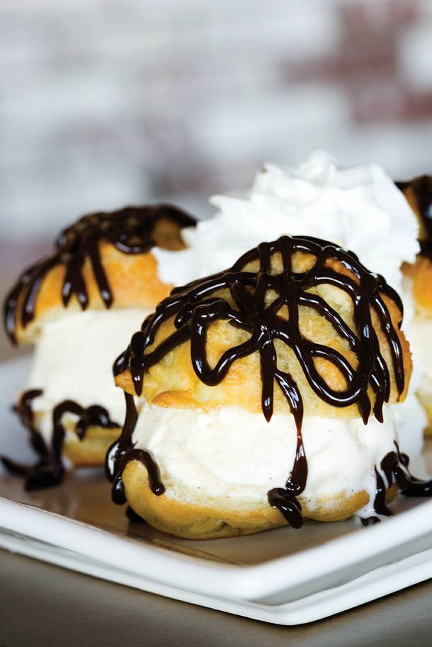 There is only dessert at Grind, but it's a good one: Vanilla Ice Cream Sliders, cream-puff shells filled with ice cream, drizzled with chocolate and topped with whipped cream.