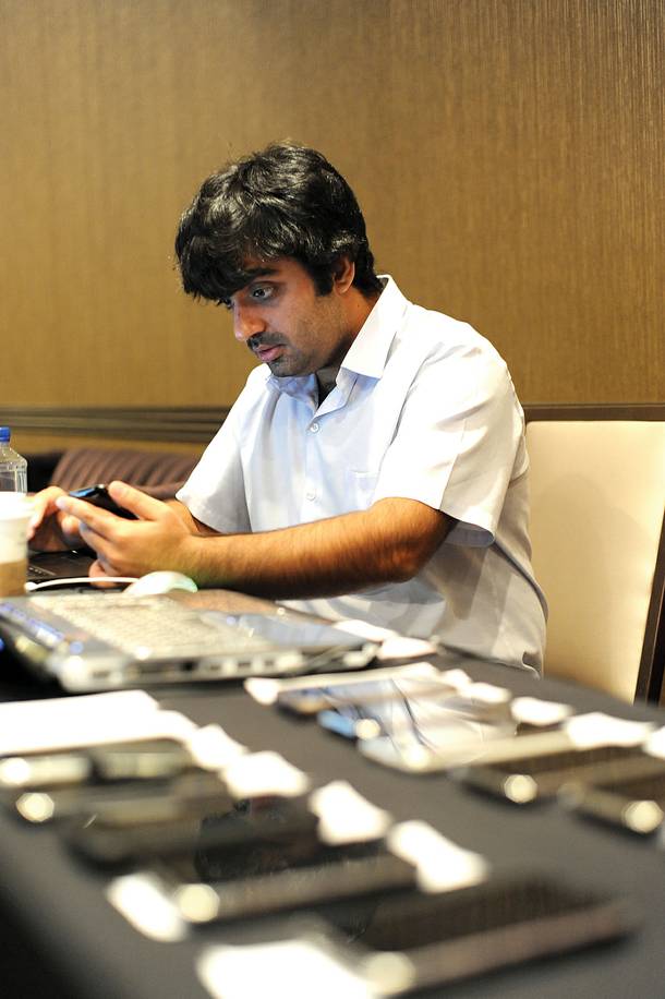 Mahipal Raythattha loads LoveSystems' pickup app into attendees' iPhones.

