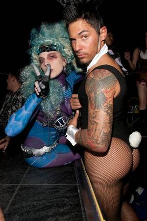 <em>Las Vegas Weekly</em>'s Deanna Rilling as a <a href="/news/2009/oct/29/perfecto-halloween-makeover/">Perfecto Alien</a> and N9NE Group's Jason "JRoc" Craig as a Playboy Bunny at 2009's JRoc-O-Ween.
