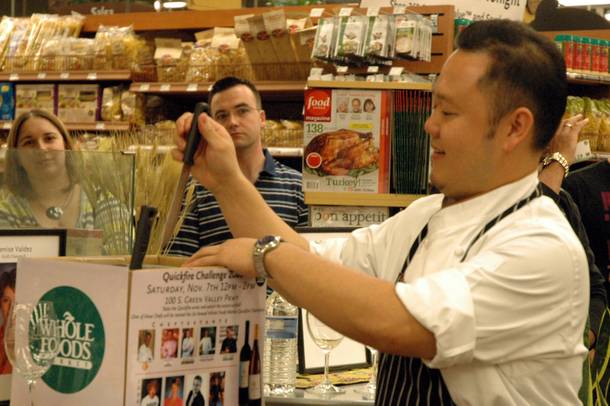 In true Top Chef style, Chef Jet Tila from Wazuzu at Wynn Las Vegas selects his protein from a knife rack.