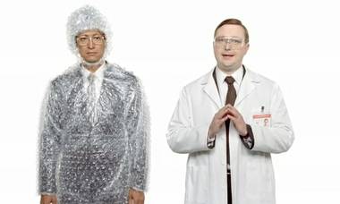 Dan Nainan (left) is “platform agnostic.” But get this: John Hodgman, the PC guy, actually uses Macs.