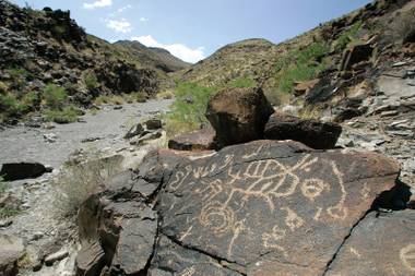 The Sloan Canyon National Conservation Area sits a not-too-cozy five miles from the site of a proposed mine.