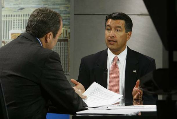 Brian Sandoval, right, discusses his candidacy for governor with Jon Ralston on Wednesday during an appearance on Face to Face With Jon Ralston at the KLAS-TV, Channel 8 studios.