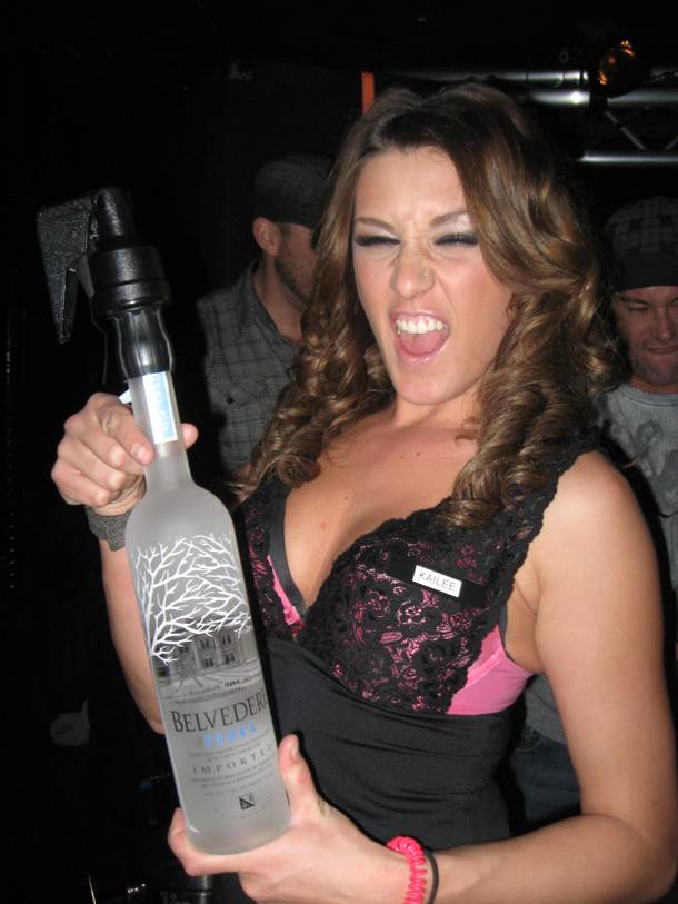 Former Wet Republic cocktail server Kailee Gielgens shows off the goods. And some vodka!