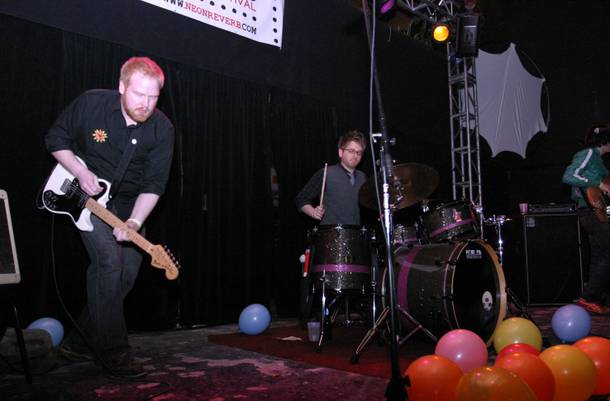 The Novelty Act plays amongst Mad Cap's balloon remains on Neon Reverb at Thunderbird Lounge.