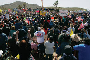 A crowd that police estimated to be about 8000 listen to Sarah Palin speak at the "Showdown in Searchlight" Tea Party Express rally just outside Searchlight Saturday, March 27, 2010.