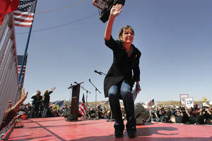 Sarah Palin waves to her fans at the "Showdown in Searchlight" Tea Party Express rally just outside Searchlight Saturday, March 27, 2010.