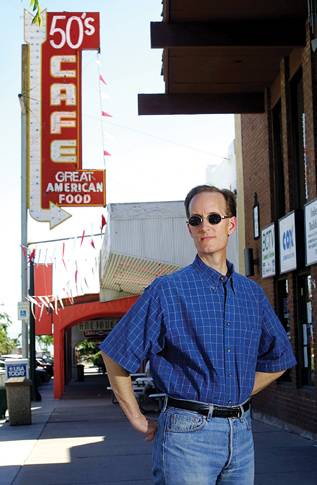 While researching the history of gay life in Las Vegas, historian Dennis McBride (photographed in 2001) also looked for an identity as a gay man.