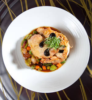 Roasted free range chicken with black garlic and fricassee of vegetables with porcini, $40.