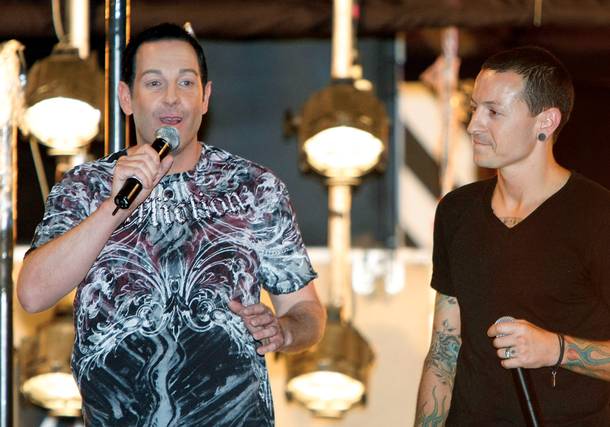 Flaming out: Steve Wyrick (left) and Linkin Park singer Chester Bennington introduce the 