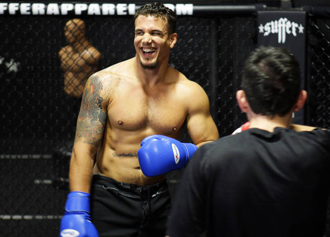 UFC heavyweight fighter Frank Mir laughs during a workout at his gym Friday, September 17, 2010. Mir will fight Mirko Cro Cop Filipovic in the main event of UFC 119 in Indianapolis.