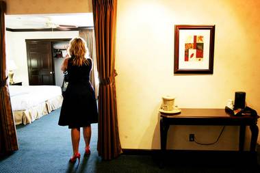 Tina Enard of Reno-based Urban Design Studios examines a suite at the El Cortez September 8, 2010.