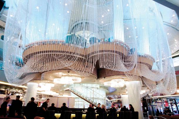 The three level Chandelier bar welcomes guests from the Strip entrance.
