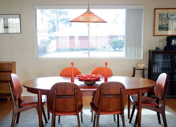 Danish modern dining table and chairs at the Las Vegas home of Bill Johnson, the owner of Retro Vegas, Monday, February 21, 2011.