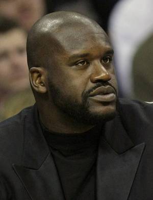 The Cleveland Cavaliers' Shaquille O'Neal sits on the bench in the second quarter of a game against the Utah Jazz in Cleveland on Nov. 14, 2009.