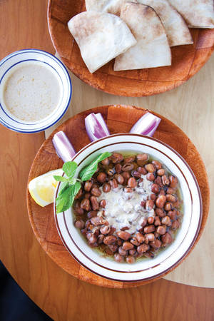 The <em>ful</em>, pronounced "fool," is a dish of fava beans amidst olive oil, lime, mint and tahini.