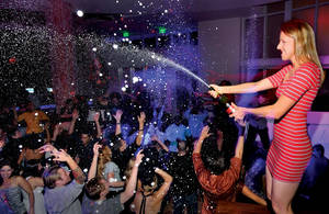 <em>Weekly</em> writer Erin Ryan attempts her first champagne spray at Tropicana Las Vegas' Club Nikki on a recent Wednesday. That's the night resident DJ duo Sex Panther spins and soaks the crowd with bubbly goodness.