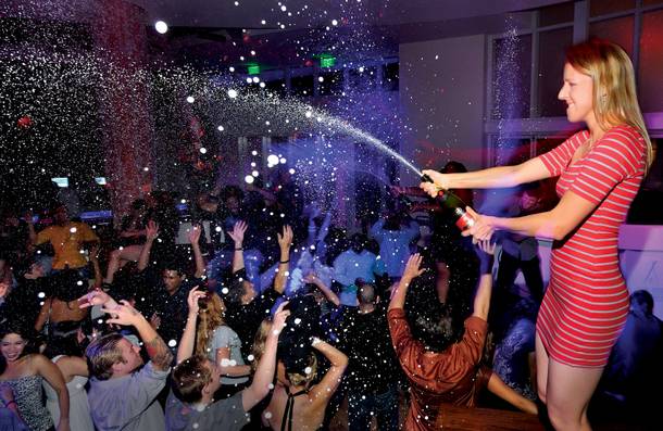 Weekly writer Erin Ryan attempts her first champagne spray at Tropicana Las Vegas' Club Nikki on a recent Wednesday. That's the night resident DJ duo Sex Panther spins and soaks the crowd with bubbly goodness.
