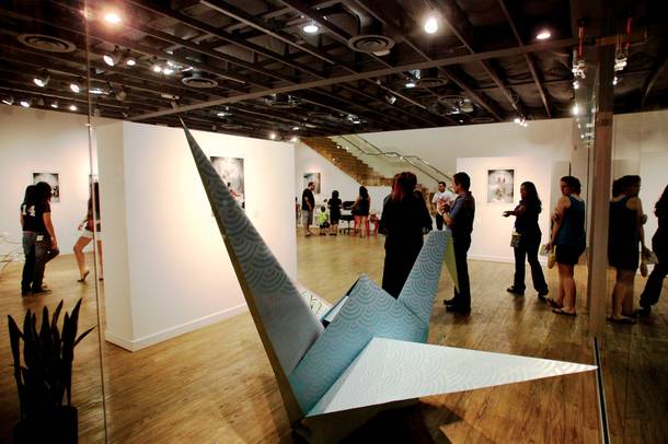 The scene inside Brett Wesley Gallery on a recent First Friday. The gallery on Charleston and Casino Center Boulevards is a main stopping point for festival goers.